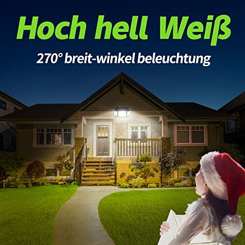 Haus mit heller Außenbeleuchtung und Weihnachtsdekoration.